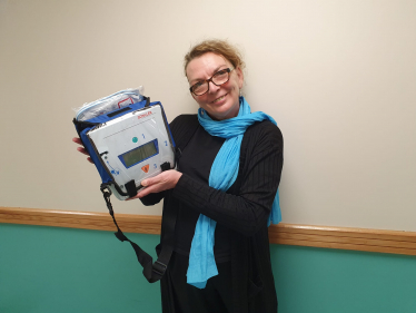 Tracey Haworth with a defib